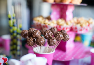 Chocolate cakepops on holiday dessert table at kid birthday party