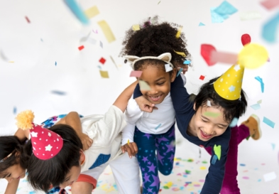 Group of kids celebrate party fun together